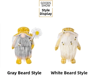 Detail view of handmade bee gnomes with gray and white beards for spring decor