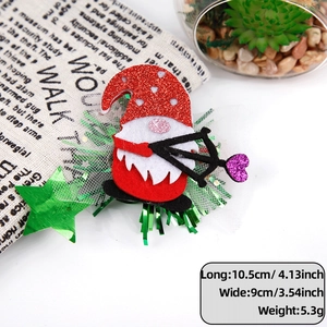 Close-up of a festive gnome hair clip with size measurements 10.5cm by 9cm