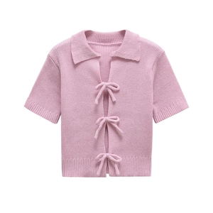 Pink short sleeve knit top with lapel collar and cute bow ties in ribbed texture
