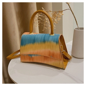 Modern gradient crossbody handbag with a curved bottom and round top handle for women
