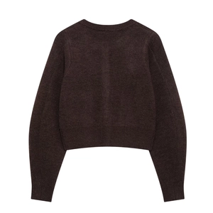 Detailed back view of a chocolate knit cardigan with ribbed cuffs and hemline