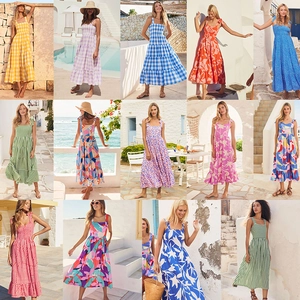 Summer sleeveless boho maxi dress with floral prints and tiered skirt for beach vacation