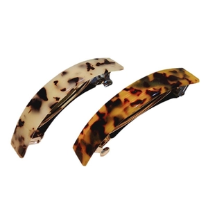 Leopard print acetate french barrettes set in ivory and amber tortoise shell