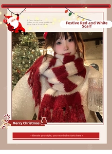 Detail of red and white striped knit scarf with long tassels for winter holiday style