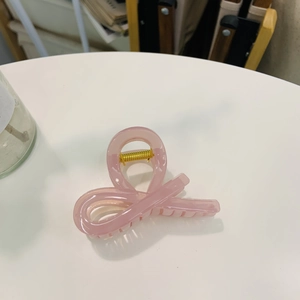 Pink translucent butterfly hair claw clip with gold metal spring for elegant women