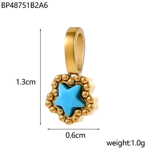 Star-shaped zircon pendant with blue gemstone and gold bead trim measuring 1.3cm in height