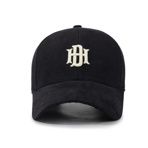 Black cotton baseball cap with embroidered letters and contrast suede-textured brim