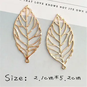 Pair of minimalist gold hollow leaf alloy pendants for DIY jewelry making 2.1x5.2cm