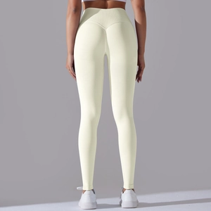 Macro detail of seamless yoga leggings with V-shaped seam for push up and lifting effect