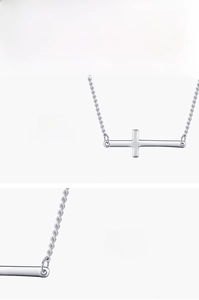 Detailed view of polished S925 sterling silver horizontal cross necklace with mirror finish