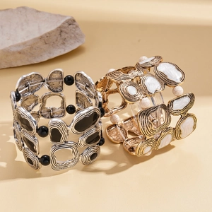 Irregular geometric textured stretch bracelets in vintage silver-black and gold-white finishes