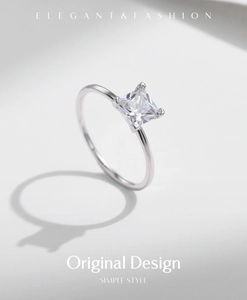 Détail macro d'une bague élégante en argent 925 avec diamant solitaire à coupe carrée