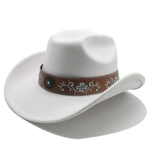 Detail of western cowboy hat with brown leather band and blue floral embroidery