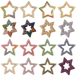 Macro shot of colorful zircon-encrusted star pendants in various finishes for jewelry DIY