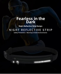 Detail view of the slim running belt featuring a reflective strip and integrated earphone port
