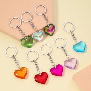 Detailed arrangement of colorful 3D resin heart keychains in various vibrant gradient shades