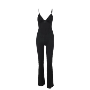 Detailed view of black lace-up bodice and slim fit design on the sleeveless jumpsuit