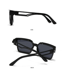 Detail view of black square sunglasses featuring unique hollowed-out side temple design