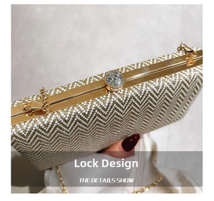Macro detail of elegant champagne gold wave texture with sparkling rhinestone clasp