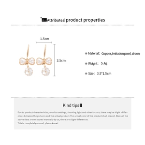 Bow earrings with pearls and zircons, detailed dimensions 3.5x1.5cm and material specs