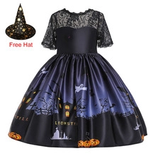 Detail of girls' Halloween witch dress with lace top, pumpkin print, and a free matching hat