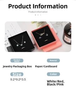 Close-up of pink and black jewelry gift boxes with foam inserts for rings and necklaces
