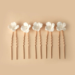 Set of 5 bridal hair pins with white ceramic flowers and crystals on rose gold U-shaped pins