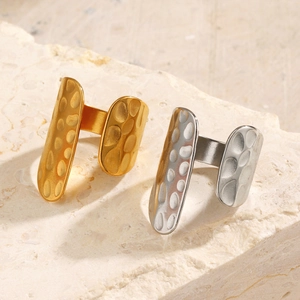 18K gold and silver plated geometric hammered open rings on natural stone background