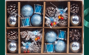Blue and silver Christmas ornament set with pine cones and drums in kraft paper box