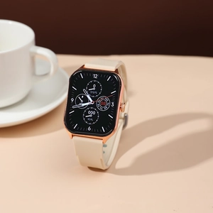 Close-up of a square rose gold smartwatch with a beige silicone strap on a neutral background