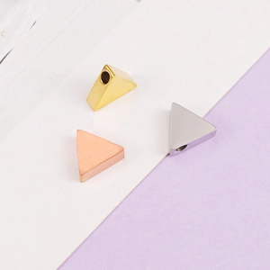 Polished stainless steel triangle beads in gold, rose gold, and silver finishes