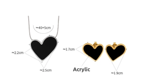 Detail showing acrylic heart pendant and earrings with precise dimensions and size