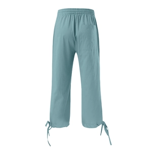 Detailed back view of light blue cotton linen trousers with drawstring cuffs and pocket