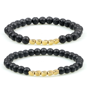 Lava stone and matte black bead stretch bracelets with irregular golden accents