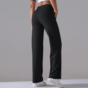 Detail view of high waist loose yoga pants showing smooth fabric and back fit design