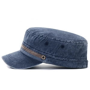 Dark blue washed cotton flat top military cap with brown decorative band and metal buckle