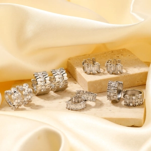 Elegant silver earrings with sparkling cubic zirconia on a minimalist stone base