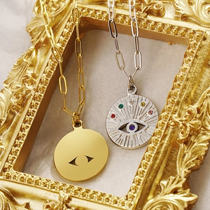 Colorful evil eye necklaces in gold and silver finish with crystal pavé and retro frame