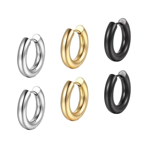 Detailed view of three pairs of thick stainless steel hoop earrings in silver, gold and black