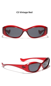 Close-up of retro red cat-eye sunglasses showing CE mark and specification details
