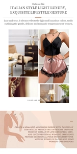 Detail view of black camisole and pink satin shorts with elegant black lace trim