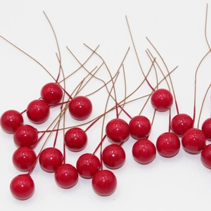 Artificial glossy red berries with long stems for home decor and festive DIY crafts