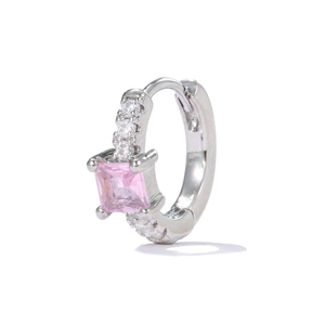 Close-up of silver hoop earring with pink square zircon and white crystal accents