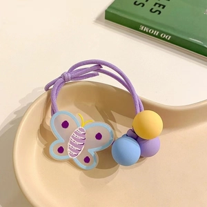 Detail of purple elastic hair tie with acrylic butterfly and candy-colored frosted beads