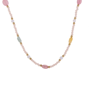 Close-up of colorful beaded necklace with natural stone crystals and gold metal accents