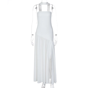 Detail of white tube top dress featuring high slit and asymmetrical hem on mannequin