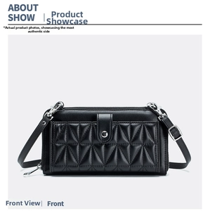 Detail of black crossbody phone bag featuring a unique 3D geometric quilted texture pattern