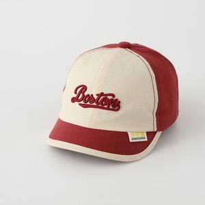 Detail of Boston embroidery and brand label on retro two-tone cotton kids baseball cap