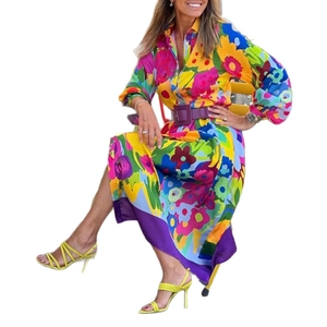 Close-up of elegant floral shirt dress with a purple wide belt and yellow high heels