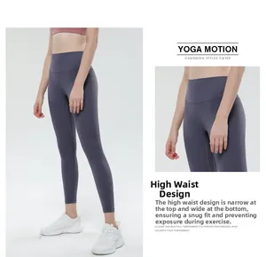 Detail of high-waisted seamless charcoal yoga pants with tummy control and lifting effect